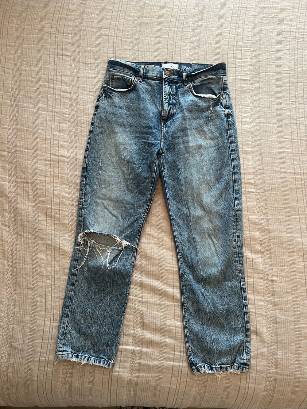 LOFT distressed light-medium wash jeans